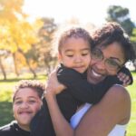 Mother and sons happy embrace